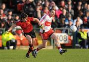 22 January 2012; Paddy Bradley, Derry, in action against Donnacha O'Higgins, Down. Power NI Dr. McKenna Cup, Semi-Final, Derry v Down, Morgan Athletic Grounds, Armagh. Picture credit: Oliver McVeigh / SPORTSFILE