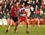 22 January 2012; Chrissy McKaigue, Derry, in action against Dan Gordon, Down. Power NI Dr. McKenna Cup, Semi-Final, Derry v Down, Morgan Athletic Grounds, Armagh. Picture credit: Oliver McVeigh / SPORTSFILE