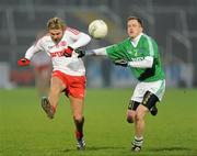 22 January 2012; Owen Mulligan, Tyrone, in action against John Woods, Fermanagh. Power NI Dr. McKenna Cup, Semi-Final, Tyrone v Fermanagh, Morgan Athletic Grounds, Armagh. Picture credit: Oliver McVeigh / SPORTSFILE