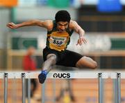 22 January 2012; Andrew Creamer, Annalee AC, Co. Cavan, jumps the last hurdle on his way to winning the Junior men's 60m Hurdles at the Woodie’s DIY Junior Indoor Track & Field Championships of Ireland. Nenagh, Co. Tipperary. Picture credit: Matt Browne / SPORTSFILE