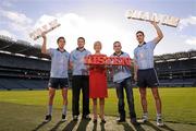 23 January 2012; Vodafone today announced that it will donate its logo space on the Dublin jersey for the first games of the National League to Vodafone Foundation charity partner SOS in an effort to promote awareness of mental health issues in Ireland. In attendance at the announcement are, from left, Dublin footballer Michael Fitzsimons, Dublin hurler Conal Keaney, CEO and founder of SOS Caroline McGuigan, former WBA Super Bantamweight World Champion Bernard Dunne and Dublin footballer James McCarthy. Vodafone Charity Initiative, Croke Park, Dublin. Photo by Sportsfile