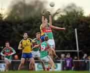 22 January 2012; Jason Gibbons, Mayo, supported by team-mates, Alan Dillon, left, Seamus O'Shea, and Alan Feeney, 19, in action against Michael Finneran, supported by team-mate Darren Coen, left, Roscommon. FBD Insurance League, Section B, Round 3, Roscommon v Mayo, Ballinlough GAA Grounds, Ballinlough, Co. Roscommon. Picture credit: Pat Murphy / SPORTSFILE
