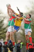 22 January 2012; Mayo's Seamus O'Shea, left, and Barry Moran, in action against Michael Finneran, Roscommon. FBD Insurance League, Section B, Round 3, Roscommon v Mayo, Ballinlough GAA Grounds, Ballinlough, Co. Roscommon. Picture credit: Pat Murphy / SPORTSFILE