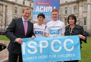 24 January 2012; An Taoiseach Enda Kenny T.D. with Elverys Sports Power Team Brand Ambassadors Ger Dolan and Claire McGlynn and Carmen Taheny, right, ISPCC corporate Fundraising, at the launch of the 2012 Elverys Sports Achill Half Marathon, which will take place on Saturday 7th July 2012 in Keel. Interested participants can register at www.achillmarathon.com. Government Buildings, Dublin. Photo by Sportsfile