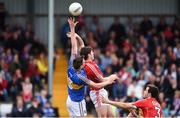 10 June 2017; Conor Sweeney of Tipperary gets to the ball ahead of Cork's Kevin Crowley to score a goal during the Munster GAA Football Senior Championship Semi-Final match between Cork and Tipperary at Pairc Ui Rinn in Cork. Photo by Matt Browne/Sportsfile