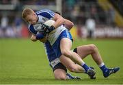 11 June 2017; Colin Walshe of Monaghan  in action against Conor Moynagh of Cavan during the Ulster GAA Football Senior Championship Quarter-Final match between Cavan and Monaghan at Kingspan Breffni, in Cavan. Photo by Oliver McVeigh/Sportsfile