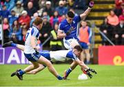 11 June 2017; Gerard Smith of Cavan has his goal bound shot blocked down by Karl O’Connell of Monaghan during the Ulster GAA Football Senior Championship Quarter-Final match between Cavan and Monaghan at Kingspan Breffni, in Cavan. Photo by Oliver McVeigh/Sportsfile
