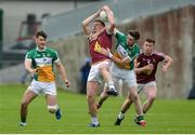 11 June 2017; John Heslin of Westmeath, supported by team-mate Ger Egan, behind, in action against David Hanlon of Offaly, supported by team-mate Eoin Carroll, left, during the Leinster GAA Football Senior Championship Quarter-Final match between Offaly and Westmeath at Bord Na Móna O'Connor Park, Tullamore, in Co. Offaly. Photo by Piaras Ó Mídheach/Sportsfile