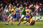 11 June 2017; James O'Donoghue of Kerry in action against Martin McMahon, right and Ciaran Russell of Clare, during the Munster GAA Football Senior Championship Semi-Final match between Kerry and Clare at Cusack Park, in Ennis, Co. Clare. Photo by Sam Barnes/Sportsfile