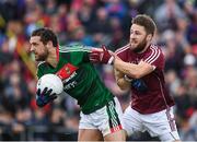 11 June 2017; Tom Parsons of Mayo in action against Michael Lundy of Galway during the Connacht GAA Football Senior Championship Semi-Final match between Galway and Mayo at Pearse Stadium, in Salthill, Galway. Photo by Ray McManus/Sportsfile