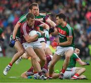 11 June 2017; Liam Silke of Galway in action against Tom Parsons and Ger Cafferkey, 3, of Mayo during the Connacht GAA Football Senior Championship Semi-Final match between Galway and Mayo at Pearse Stadium, in Salthill, Galway. Photo by Ray McManus/Sportsfile