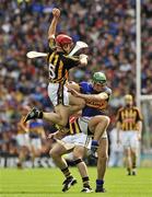 4 September 2011; Tommy Walsh, Kilkenny, with support from team-mate Michael Rice, wins a puck out against Noel McGrath, Tipperary. GAA Hurling All-Ireland Senior Championship Final, Kilkenny v Tipperary, Croke Park, Dublin. Picture credit: Barry Cregg / SPORTSFILE