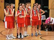 25 January 2012; The St.Angela's players watch the presentation ceremony after defeat to Our Lady's Castleblayney. All-Ireland Schools Cup U19B Girls Final, Our Lady's Castleblayney, Monaghan v St.Angela's Waterford, National Basketball Arena, Tallaght, Dublin. Picture credit: Pat Murphy / SPORTSFILE