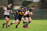 25 January 2012; Robbie Mullen, right, Newbridge College, with support from team-mate Calum O'Brien, is tackled by Conor Spillane, centre, and Eoin Ryan, left, The King’s Hospital School. Powerade Leinster Schools Vinnie Murray Cup, Semi-Final, Newbridge College v The King’s Hospital School, NUIM Maynooth, Co. Kildare. Picture credit: Barry Cregg / SPORTSFILE