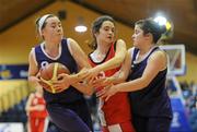 25 January 2012; Sinead Kindlon, St. Angela's Waterford, is dispossessed by Olga Tavey, left, and Ciara Farrell, Our Lady's Castleblayney. All-Ireland Schools Cup U19B Girls Final, Our Lady's Castleblayney, Monaghan v St. Angela's Waterford, National Basketball Arena, Tallaght, Dublin. Picture credit: Pat Murphy / SPORTSFILE
