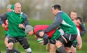 26 January 2012; Ireland's Gordon D'Arcy, supported by Jack McGrath, is tackled by James Coughlan during squad training ahead of their RBS Six Nations Rugby Championship game against Wales on February 5th. Ireland Rugby Squad Training, University of Limerick, Limerick. Picture credit: Diarmuid Greene / SPORTSFILE