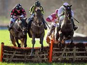 26 January 2012; Burrenbridge Lodge, centre, with Tom Doyle up, jump the last on their way to winning the P.J.Foley Memorial Hurdle from second place One Cool Shabra, left, with Jim Cullen up, and eventual third Gorgeous Sixty, with Ruby Walsh up. Gowran Park, Gowran, Co. Kilkenny. Picture credit: Matt Browne / SPORTSFILE