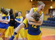 26 January 2012; Christ the King players Ciara McCarthy lifts her twin sister and team-mate Hannah McCarthy after the win. All-Ireland Schools Cup U16B Girls Final, Christ the King, Cork v Our Lady's Templemore, Tipperary, National Basketball Arena, Tallaght, Dublin. Picture credit: Brian Lawless / SPORTSFILE