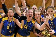 26 January 2012; The Christ the King players celebrate with the cup. All-Ireland Schools Cup U16B Girls Final, Christ the King, Cork v Our Lady's Templemore, Tipperary, National Basketball Arena, Tallaght, Dublin. Picture credit: Brian Lawless / SPORTSFILE