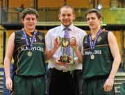 27 January 2012; Receiving the winning trophy from Senior Competitions Officer of Basketball Ireland Conor Lilly are St. Mary's CBGS captains Donal Brady, left, and Peter Ferguson. All-Ireland Schools Cup U19B Boys Final, St. Mary's CBGS, Belfast v St. Conleths, Dublin, National Basketball Arena, Tallaght, Dublin. Picture credit: Barry Cregg / SPORTSFILE