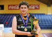 27 January 2012; St. Mary's CBGS captain Donal Brady with the trophy after the game. All-Ireland Schools Cup U19B Boys Final, St. Mary's CBGS, Belfast v St. Conleths, Dublin, National Basketball Arena, Tallaght, Dublin. Picture credit: Barry Cregg / SPORTSFILE