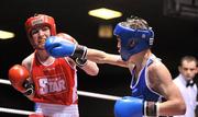 27 January 2012; Hugh Myers, left, Ryston Boxing Club, in action against Evan Metcalfe, Crumlin Boxing Club, during their 49kg bout. 2012 National Elite Boxing Championship Semi-Finals, National Stadium, Dublin. Picture credit: David Maher / SPORTSFILE