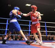 27 January 2012; John Joe Nevin, right, Cavan Boxing Club, in action against Sean McComb, Holy Trinity Boxing Club, during their 56kg bout. 2012 National Elite Boxing Championship Semi-Finals, National Stadium, Dublin. Picture credit: David Maher / SPORTSFILE