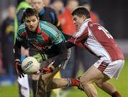 27 January 2012; Ger Cafferky, Mayo, in action against Ian Galvin, N.U.I. Galway. FBD Insurance League Home Final, N.U.I. Galway v Mayo, McHale Park, Castlebar, Co. Mayo. Photo by Sportsfile