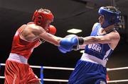 27 January 2012; Michael McDonagh, left, St. Mary's Boxing Club, Dublin, in action against Tyrone McCullough, Holy Faith Boxing Club, during their 60kg bout. 2012 National Elite Boxing Championship Semi-Finals, National Stadium, Dublin. Picture credit: David Maher / SPORTSFILE