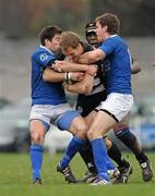 28 January 2012; Alan Trenier, Old Belvedere, is tackled by Philip Brophy, left, and Mark Sexton, St Mary's College. Ulster Bank League, Division 1A, Old Belvedere v St Mary's College, Anglesea Road, Ballsbridge, Dublin. Picture credit: Brendan Moran / SPORTSFILE