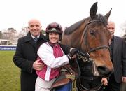 28 January 2012; Jockey Katie Walsh, with her father and trainer of Seabass Ted Walsh, after she won The Leopardstown Handicap Steeplechase aboard Seabass. Leopardstown Racecourse, Leopardstown, Co. Dublin. Photo by Sportsfile