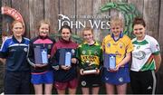 12 June 2017; First-place finisher Amy O'Sullivan from Cillard Camogie Club, Co Kerry, fourth from left, pictured alongside co-second place finishers Katie Gilchrist from Shamrocks GAA Club, Co Galway, third from left, Alanna Fox, from Feakle GAA Club, Co Clare, fifth from left, third place finisher Rebecca Farrell from Knockavilla Donaskeigh Kickhams GAA Club, Co Tipperary, second from left, camogie coach Kathleen Egan, far left, and Carlow's Kate Nolan after participating in the camogie competition at the John West Skills Day in the National Sports Campus on Saturday 10th June. The Skills Day is an opportunity for Ireland’s rising football, hurling & camogie stars to show their skills ahead of the John West Féile na nÓg and John West Féile na nGael competitions. At Abbottstown in Dublin. Photo by Cody Glenn/Sportsfile
