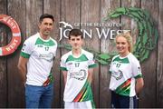 12 June 2017; Edward Brennan from Dromcollogher Broadford GAA Club, Co Limerick, pictured with Donegal's Rory Kavanagh and Monaghan’s Eimear McAnespie after participating in the boys football competition at the John West Skills Day in the National Sports Campus on Saturday 10th June. The Skills Day is an opportunity for Ireland’s rising football, hurling & camogie stars to show their skills ahead of the John West Féile na nÓg and John West Féile na nGael competitions. At Abbottstown in Dublin. Photo by Cody Glenn/Sportsfile