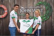 12 June 2017; Maeve Lennon from Derrynoose GAA Club, Co Armagh, pictured with Donegal's Rory Kavanagh and Monaghan’s Eimear McAnespie after participating in the girls football competition at the John West Skills Day in the National Sports Campus on Saturday 10th June. The Skills Day is an opportunity for Ireland’s rising football, hurling & camogie stars to show their skills ahead of the John West Féile na nÓg and John West Féile na nGael competitions. At Abbottstown in Dublin. Photo by Cody Glenn/Sportsfile