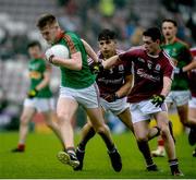 11 June 2017; John Gallagher of Mayo in action against Oisín Moran of Galway during the GAA Connacht GAA Football U17 Championship Final match between Galway and Mayo at Pearse Stadium, Salthill, Galway. Photo by Daire Brennan/Sportsfile