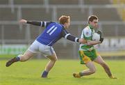 15 January 2012; Martin O'Reilly, Donegal, in action against Declan McKiernan, Cavan. Power NI Dr. McKenna Cup - Section C, Cavan v Donegal, Kingspan Breffni Park, Cavan. Picture credit: Brian Lawless / SPORTSFILE