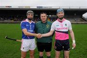 28 January 2012; Munster XV captain Paul Curran shakes hands with Tipperary captain John O'Brien in the presence of referee Brian Gavin before the start of the game. Charity match in aid of Breast Cancer Ireland, Tipperary v Munster XV, McDonagh Park, Nenagh, Co. Tipperary. Picture credit: Matt Browne / SPORTSFILE