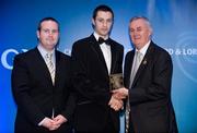 28 January 2012; Uachtarán CLG Criostóir Ó Cuana presents James Godley, from Kerry, with his Christy Ring award, alongside Alan Smullen, General Manager, Croke Park Hotel. The Christy Ring, Nicky Rackard & Lory Meagher Champion 15 Awards 2011, Croke Park, Dublin. Picture credit: Barry Cregg / SPORTSFILE