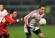 28 January 2012; Stephen O'Neill, Tyrone, in action against Ryan Dillon, Derry. Power NI Dr. McKenna Cup Final, Derry v Tyrone, Morgan Athletic Grounds, Armagh. Picture credit: Oliver McVeigh / SPORTSFILE