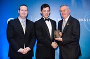 28 January 2012; Uachtarán CLG Criostóir Ó Cuana presents Brendan Ennis, from Down, with his Christy Ring award, alongside Alan Smullen, General Manager, Croke Park Hotel. The Christy Ring, Nicky Rackard & Lory Meagher Champion 15 Awards 2011, Croke Park, Dublin. Picture credit: Barry Cregg / SPORTSFILE