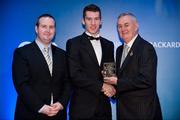 28 January 2012; Uachtarán CLG Criostóir Ó Cuana presents Peter Treanor, from Monaghan, with his Nicky Rackard award, alongside Alan Smullen, General Manager, Croke Park Hotel. The Christy Ring, Nicky Rackard & Lory Meagher Champion 15 Awards 2011, Croke Park, Dublin. Picture credit: Barry Cregg / SPORTSFILE