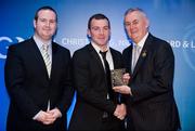 28 January 2012; Uachtarán CLG Criostóir Ó Cuana presents John Coyne, from Roscommon, with his Nicky Rackard award, alongside Alan Smullen, General Manager, Croke Park Hotel. The Christy Ring, Nicky Rackard & Lory Meagher Champion 15 Awards 2011, Croke Park, Dublin. Picture credit: Barry Cregg / SPORTSFILE