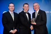 28 January 2012; Uachtarán CLG Criostóir Ó Cuana presents Chris Brough, from Warwickshire, Engalnd, with his Lory Meagher award, alongside Alan Smullen, General Manager, Croke Park Hotel. The Christy Ring, Nicky Rackard & Lory Meagher Champion 15 Awards 2011, Croke Park, Dublin. Picture credit: Barry Cregg / SPORTSFILE