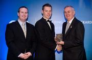 28 January 2012; Uachtarán CLG Criostóir Ó Cuana presents Shane O'Hanlon, from Warwickshire, Engalnd, with his Lory Meagher award, alongside Alan Smullen, General Manager, Croke Park Hotel. The Christy Ring, Nicky Rackard & Lory Meagher Champion 15 Awards 2011, Croke Park, Dublin. Picture credit: Barry Cregg / SPORTSFILE