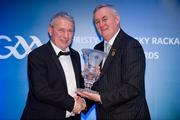 28 January 2012; Uachtarán CLG Criostóir Ó Cuana presents John Flaherty, from Offaly, with his Legend award. The Christy Ring, Nicky Rackard & Lory Meagher Champion 15 Awards 2011, Croke Park, Dublin. Picture credit: Barry Cregg / SPORTSFILE