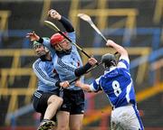 29 January 2012; Ryan O'Dwyer and Shane Stapleton, right, Dublin, in action against James Walsh, Laois. Bord na Mona Walsh Cup, Laois v Dublin, O'Moore Park, Portlaoise, Co. Laois. Picture credit: David Maher / SPORTSFILE