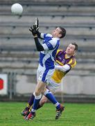 29 January 2012; Kieran Lillis, Laois, in action against Paddy Byrne, Wexford. Bord Na Mona O'Byrne Shield Final, Wexford v Laois, Wexford Park, Wexford. Picture credit: Matt Browne / SPORTSFILE