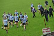 29 January 2012; Dublin players and backroom staff walk off the pitch at the end of the game. Bord na Mona Walsh Cup, Laois v Dublin, O'Moore Park, Portlaoise, Co. Laois. Picture credit: David Maher / SPORTSFILE