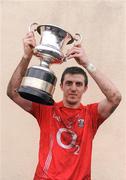 29 January 2012; Cork captain Ray Carey lifts the McGrath Cup. McGrath Cup Football Final, Tipperary v Cork, Clonmel Sportsfield, Clonmel, Co. Tipperary. Picture credit: Stephen McCarthy / SPORTSFILE