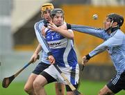 29 January 2012; Darren Maher, Laois, in action against Declan O'Dwyer, right, and Eamon Dillon, Dublin. Bord na Mona Walsh Cup, Laois v Dublin, O'Moore Park, Portlaoise, Co. Laois. Picture credit: David Maher / SPORTSFILE